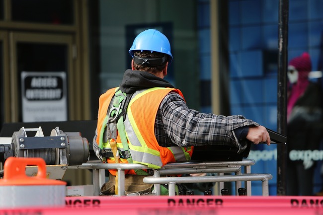 construction worker at work in city