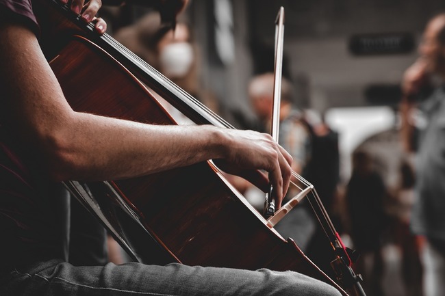 man playing cello