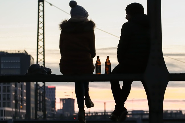 couple having drink at sunset