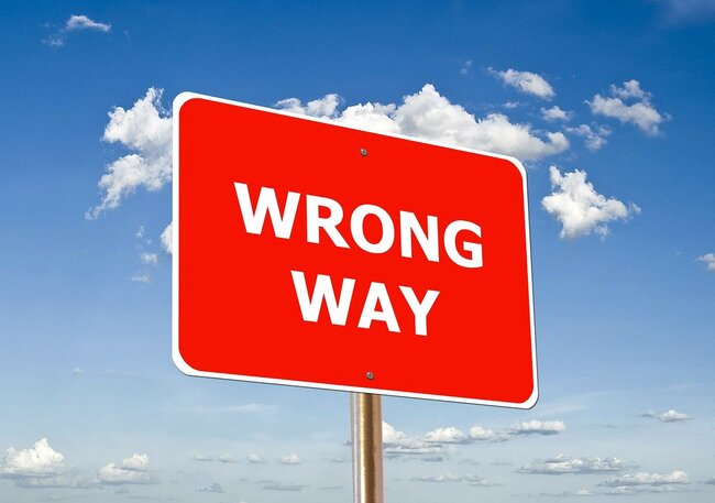 red wrong way sign