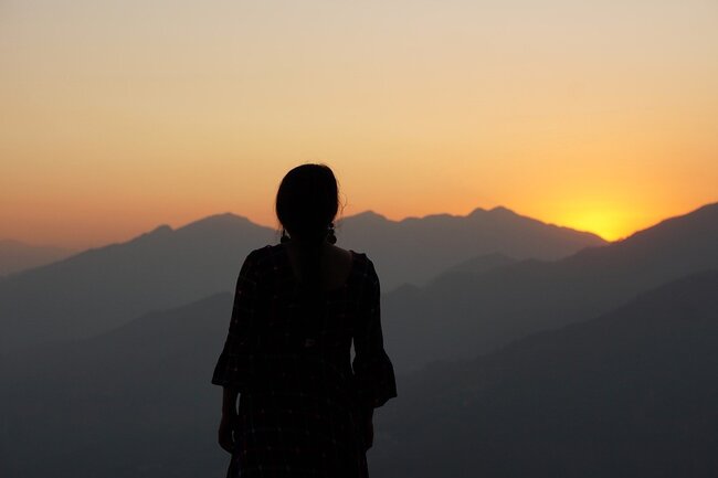 woman silhouette at sunset